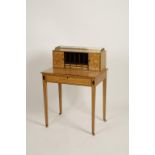 A SHERATON REVIVAL SATINWOOD LADIES WRITING DESK, the upper section with three-quarter pierced brass