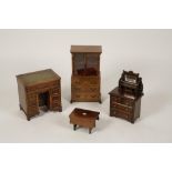 A QUEEN ANNE STYLE YEW VENEERED MINIATURE KNEEHOLE DESK, a similar walnut veneered cabinet and two