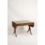 A LATE GEORGE III ROSEWOOD AND SATINWOOD STRUNG SOFA TABLE, the rectangular top with drop flap