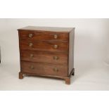 A GEORGE III MAHOGANY CHEST OF DRAWERS, the rectangular top with a moulded border above four long