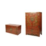 AN ORIENTAL SCARLET AND GOLD LACQUERED WARDROBE and blanket box ensuite, richly decorated with
