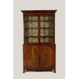 A GEORGE III MAHOGANY LIBRARY BOOKCASE, the upper section with twin astragal glazed doors