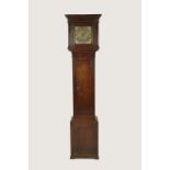 AN OAK LONGCASE CLOCK