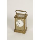 A FRENCH BRASS CASED REPEATING CARRIAGE CLOCK,