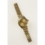 ROLEX: A LADIES 18K YELLOW GOLD WRISTWATCH