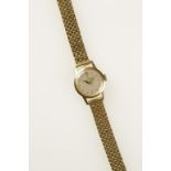 OMEGA: A LADIES 18CT YELLOW GOLD WRISTWATCH