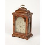 A WALNUT CASED BRACKET CLOCK,