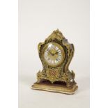 A FRENCH BOULLE AND ORMOLU MANTLE CLOCK