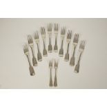 A HARLEQUIN SET OF SIX GEORGE IV TABLE FORKS