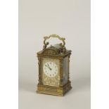 A GILT METAL CARRIAGE CLOCK