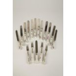 A SET OF 17 SILVER PLATED AND PORCELAIN KNIVES AND FORKS