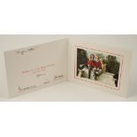 TRH THE PRINCE AND PRINCESS OF WALES: SIGNED CHRISTMAS CARD, with twin gilt embossed ciphers to