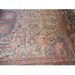 A LARGE NORTH WEST PERSIAN TYPE CARPET with central blue and red foliate and abstract decoration