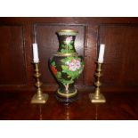 A CLOISONNE VASE decorated with flowering foliage against a dark ground, on a hardwood base, 30.