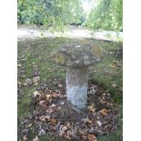 A STADDLESTONE TOP on an irregular rectangular stone column, 30" x 21"