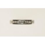 A DIAMOND HALF ETERNITY RING