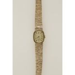 A LADIES YELLOW GOLD WRISTWATCH