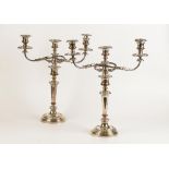 A PAIR OF 19TH CENTURY PLATE ON COPPER THREE LIGHT CANDELABRA