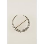 A DIAMOND CRESCENT BROOCH