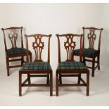 A SET OF FOUR GEORGE III MAHOGANY DINING CHAIRS