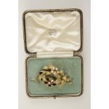 A VICTORIAN GARNET AND PEARL BROOCH