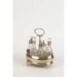 A GEORGE III CRUET STAND of oval form,