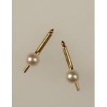 CARTIER: A PAIR OF NATURAL SALT WATER PEARL DRESS STUDS