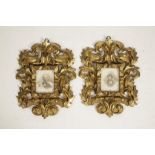 A PAIR OF CONTINENTAL ROCOCO STYLE GILTWOOD FRAMES