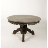 AN INDIAN CIRCULAR MARBLE TOP CENTRE TABLE