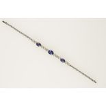 A 1920'S DIAMOND AND SAPPHIRE LINE BRACELET