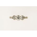 A THREE STONE DIAMOND RING