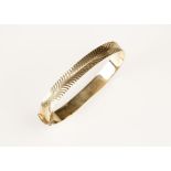 A 9CT YELLOW GOLD BANGLE