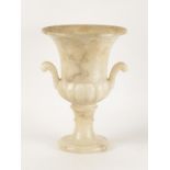 A LARGE POLISHED ALABASTER VASE