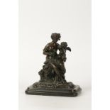 A CAST AND PATINATED BRONZE STUDY OF A LOOSELY CLAD FEMALE