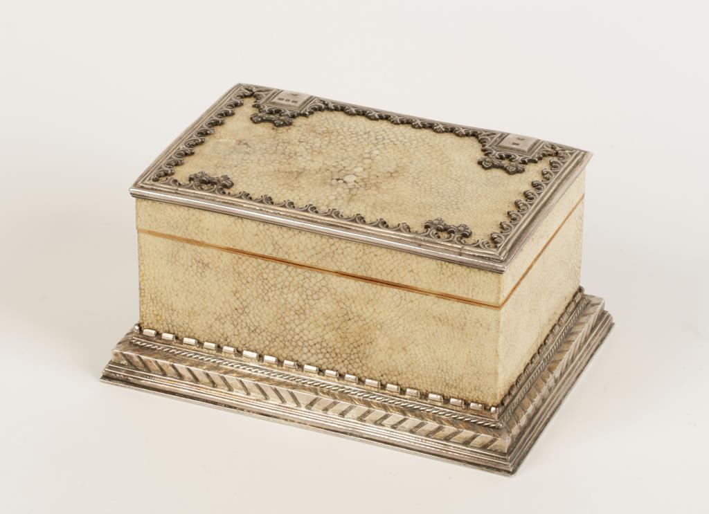 OMAR RAMSDEN: AN ARTS AND CRAFTS SILVER MOUNTED SHAGREEN TABLE CIGARETTE BOX