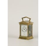 A FRENCH BRASS CASED STRIKING CARRIAGE CLOCK