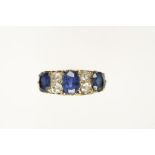 A SAPPHIRE AND DIAMOND DRESS RING