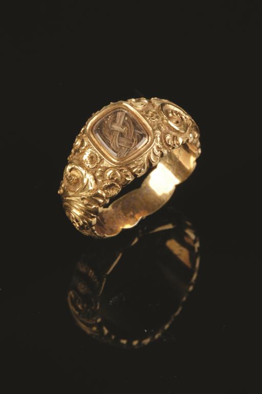 THE NELSON-HALLOWELL RING: A YELLOW GOLD MEMORIAL RING