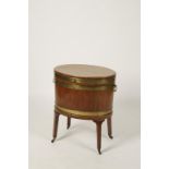 A GEORGE III MAHOGANY BRASS BOUND WINE COOLER