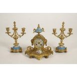 A GILT METAL AND SEVRES STYLE CLOCK GARNITURE
