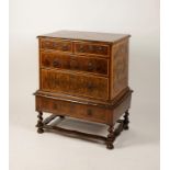 A QUEEN ANNE OYSTER VENEERED CHEST ON STAND,