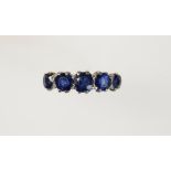 A FIVE STONE SAPPHIRE DRESS RING