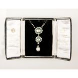 A NATURAL SALT WATER PEARL, DIAMOND AND EMERALD PENDANT NECKLACE