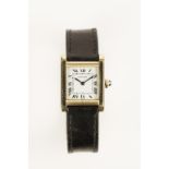 CARTIER: A LADIES YELLOW GOLD TANK WRISTWATCH