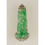 AN ART DECO CARVED JADEITE AND DIAMOND BROOCH