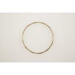 A 9CT YELLOW GOLD BANGLE