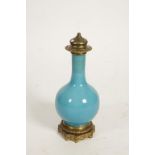 A CHINESE TURQUOISE MONOCHROME VASE