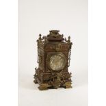 A LARGE LATE VICTORIAN OAK AND GILT METAL MOUNTED BRACKET CLOCK