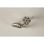 A DIAMOND FLOWERHEAD RING