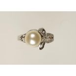 A PEARL AND DIAMOND DRESS RING